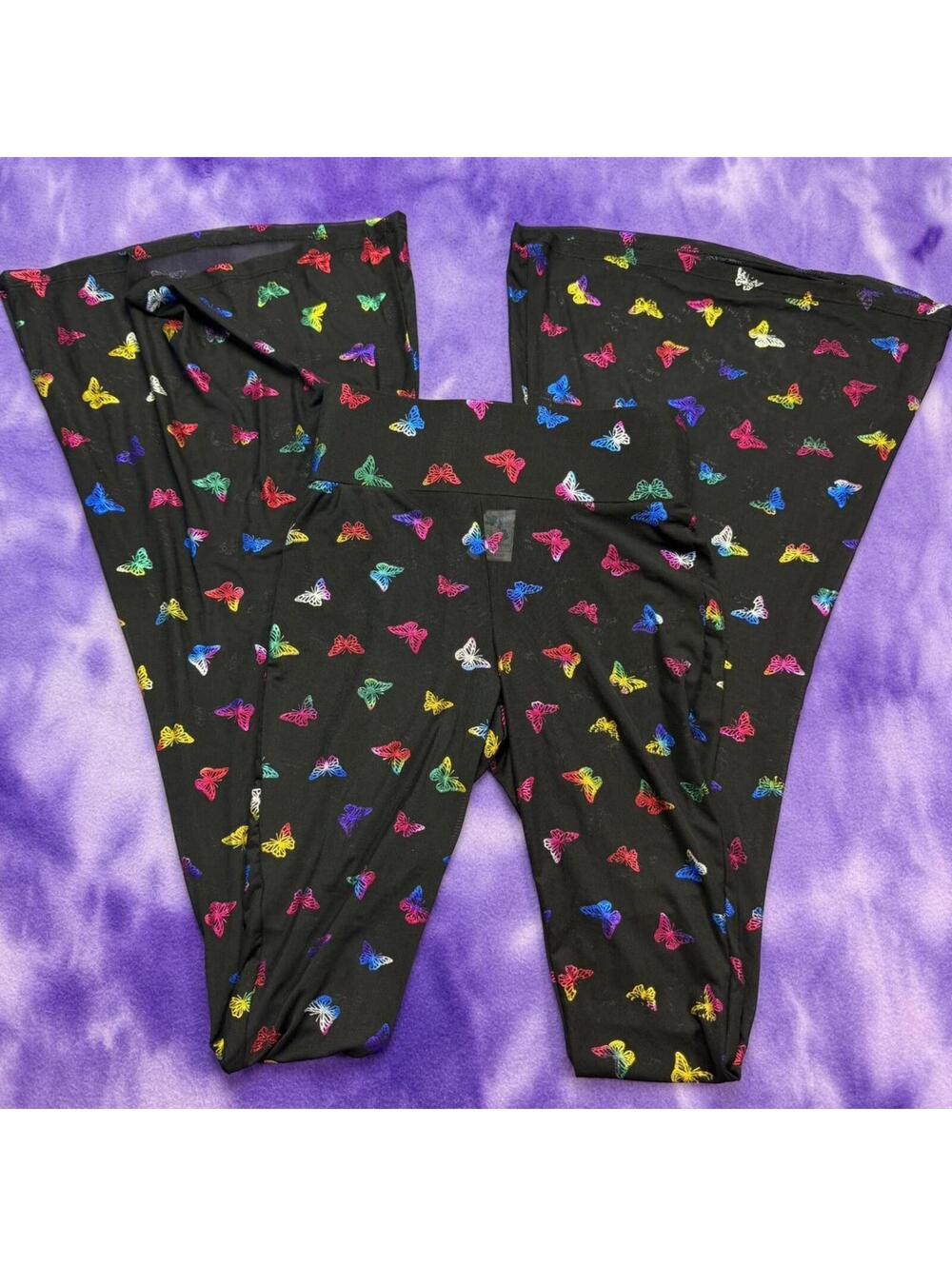 iheartraves black mesh sheer pants with rainbow foil metallic butterfiles